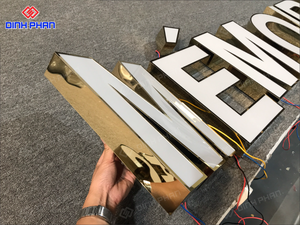 Làm chữ inox vàng gương BMT