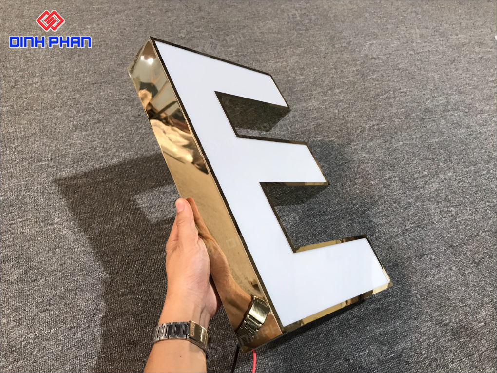 Làm chữ inox vàng gương BMT